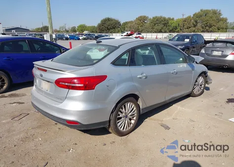 2017 Ford Focus Titanium z USA, uszkodzony, nr VIN 1FADP3J25HL268315